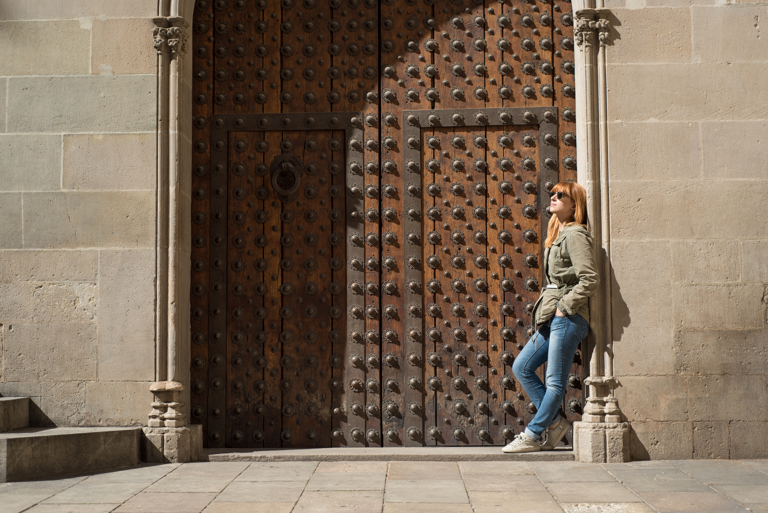  Serena from Venice posing in an interesting doorway on the Gothic Quarter Tour. Flytographer:  Francisco  